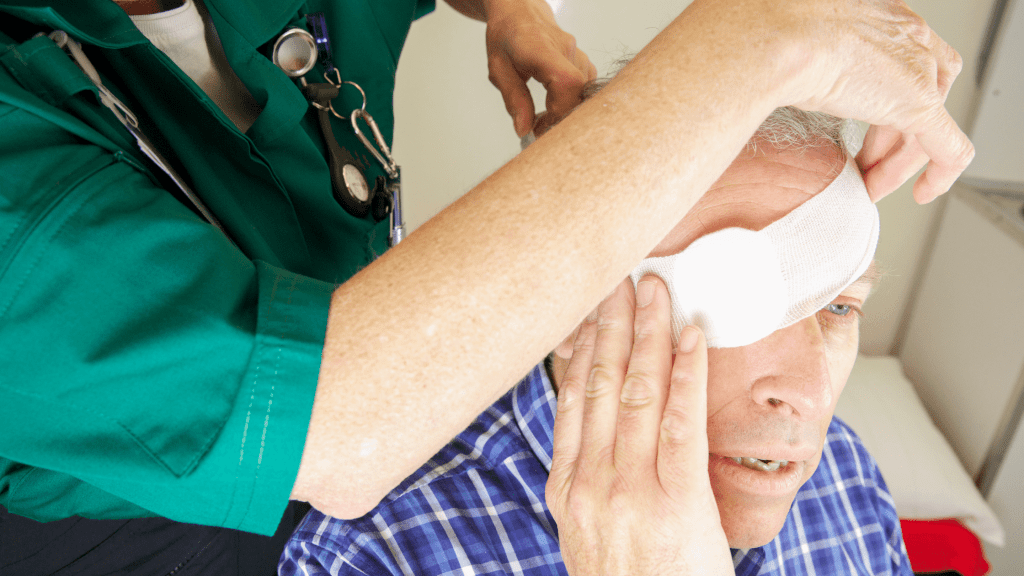 Protect Your Eyes at Work; man with eye injury being treated 