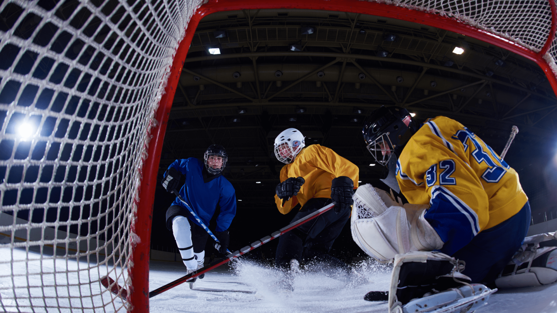 hockey players with face masks and eye protection glasses