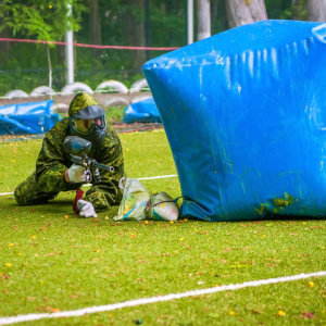 paintball player wearing eye protection headgear