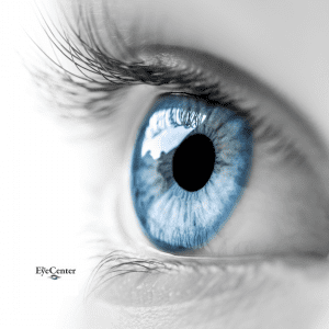 black and white photo of eye with blue iris