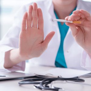 doctor telling patient to stop smoking for their eye health