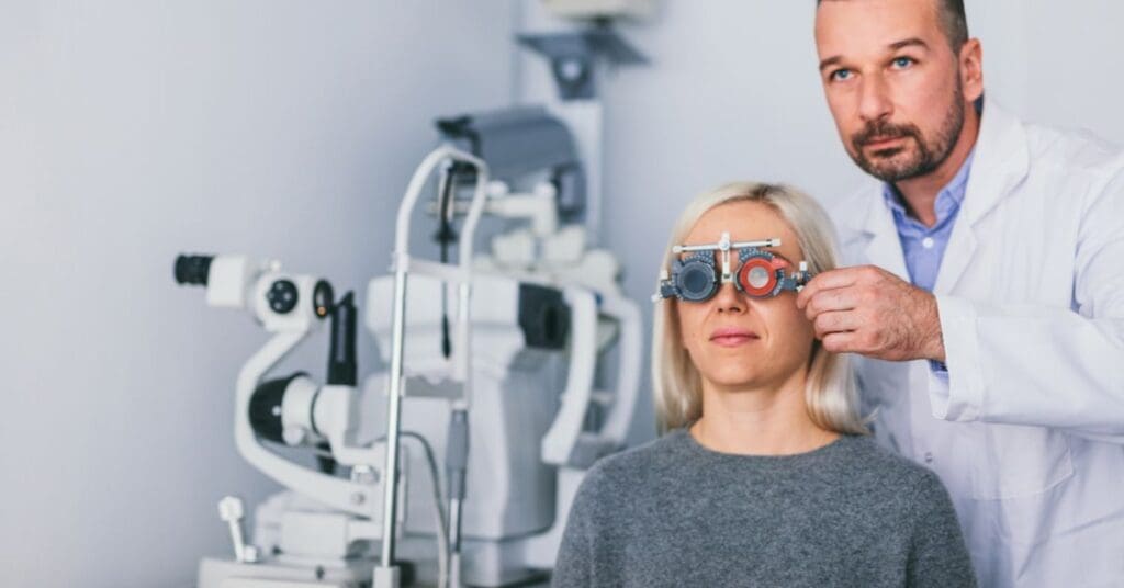 Woman getting an eye exam with a male doctor